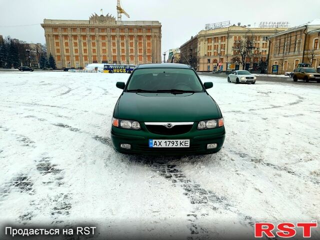 Зеленый Мазда 626, объемом двигателя 2 л и пробегом 196 тыс. км за 3800 $, фото 4 на Automoto.ua