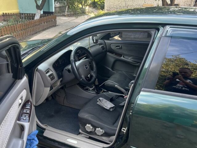 Зелений Мазда 626, об'ємом двигуна 2 л та пробігом 340 тис. км за 2200 $, фото 5 на Automoto.ua