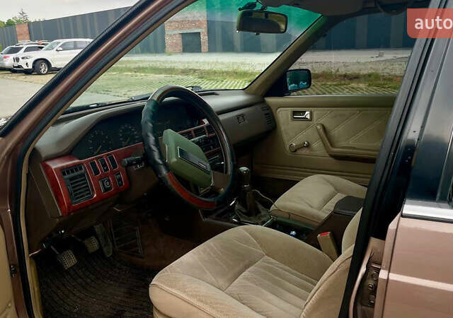 Коричневий Мазда 929, об'ємом двигуна 2 л та пробігом 275 тис. км за 3500 $, фото 5 на Automoto.ua
