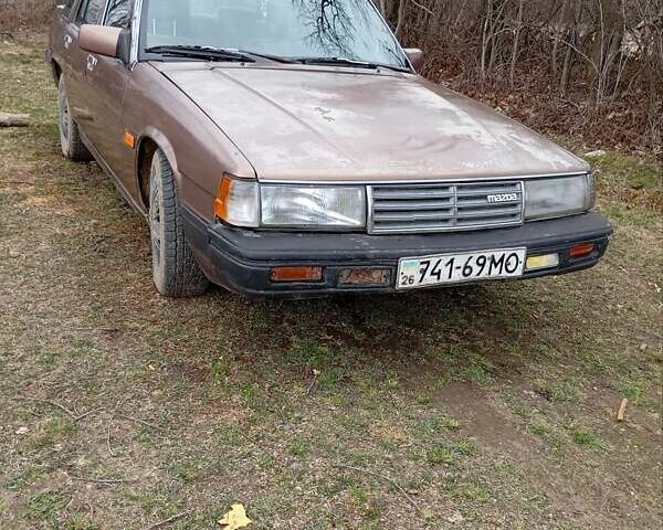 Коричневый Мазда 929, объемом двигателя 2 л и пробегом 290 тыс. км за 1300 $, фото 4 на Automoto.ua