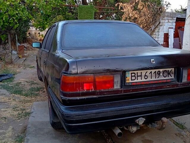 Коричневый Мазда 929, объемом двигателя 2.2 л и пробегом 280 тыс. км за 900 $, фото 4 на Automoto.ua