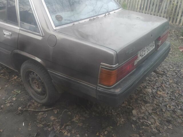 Серый Мазда 929, объемом двигателя 2 л и пробегом 10 тыс. км за 638 $, фото 2 на Automoto.ua