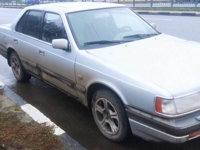 Серый Мазда 929, объемом двигателя 2.2 л и пробегом 340 тыс. км за 950 $, фото 2 на Automoto.ua