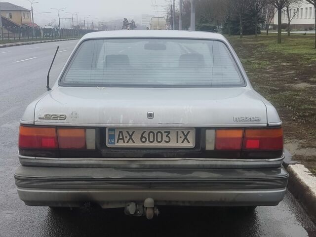 Серый Мазда 929, объемом двигателя 2.2 л и пробегом 340 тыс. км за 950 $, фото 1 на Automoto.ua