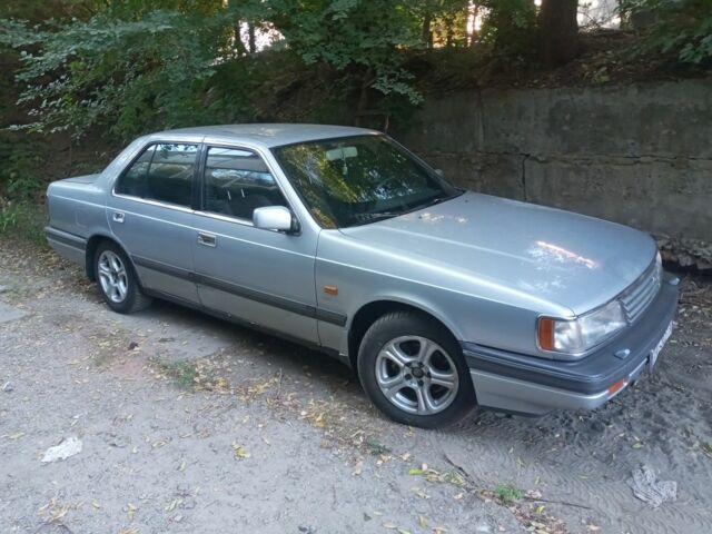 Серый Мазда 929, объемом двигателя 2 л и пробегом 291 тыс. км за 1700 $, фото 1 на Automoto.ua