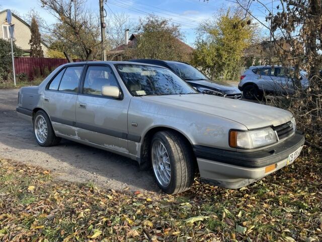 Серый Мазда 929, объемом двигателя 2.2 л и пробегом 284 тыс. км за 1500 $, фото 1 на Automoto.ua