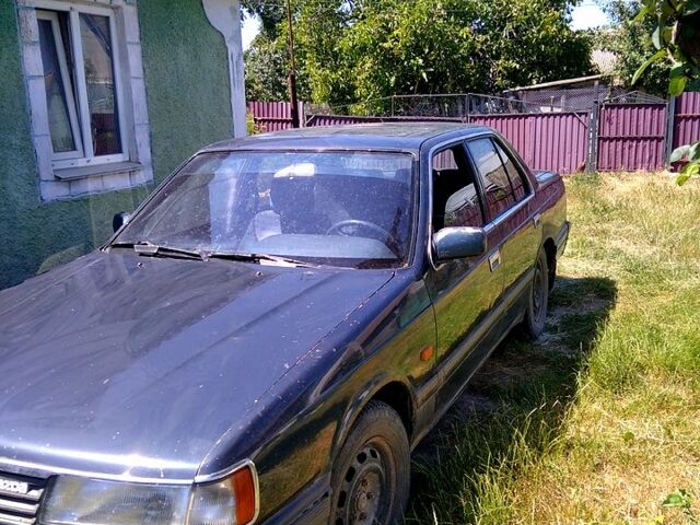 Синий Мазда 929, объемом двигателя 2 л и пробегом 220 тыс. км за 1350 $, фото 5 на Automoto.ua