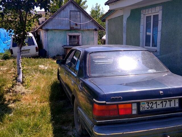 Синий Мазда 929, объемом двигателя 2 л и пробегом 220 тыс. км за 1350 $, фото 2 на Automoto.ua