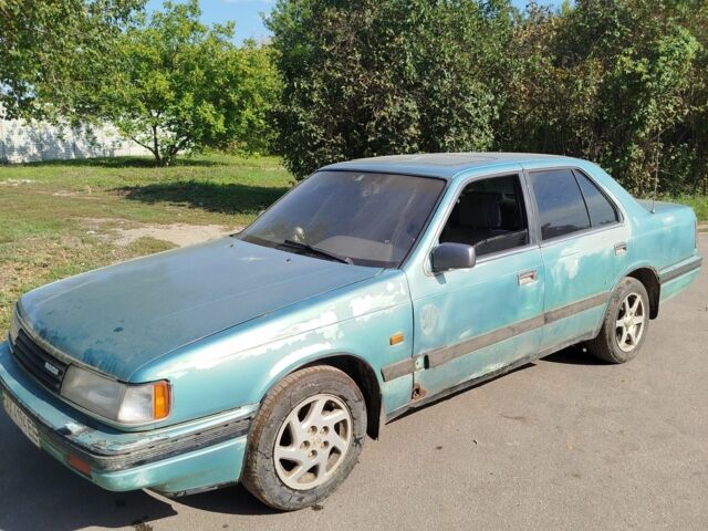 Зеленый Мазда 929, объемом двигателя 2.2 л и пробегом 400 тыс. км за 500 $, фото 6 на Automoto.ua