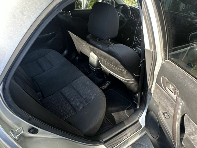 Серый Мазда Атенза, объемом двигателя 2 л и пробегом 235 тыс. км за 2500 $, фото 3 на Automoto.ua