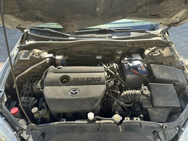 Серый Мазда Атенза, объемом двигателя 2 л и пробегом 235 тыс. км за 2500 $, фото 1 на Automoto.ua