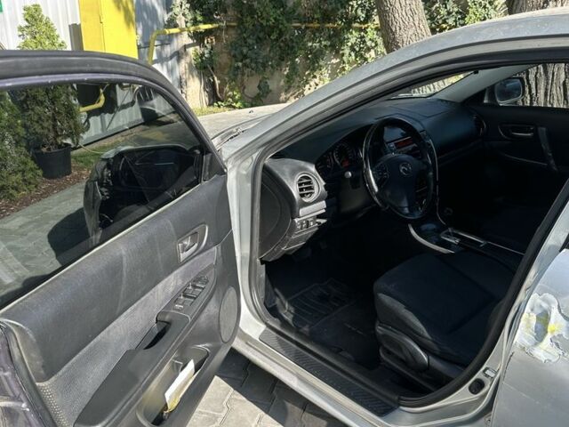 Серый Мазда Атенза, объемом двигателя 2 л и пробегом 235 тыс. км за 2500 $, фото 10 на Automoto.ua