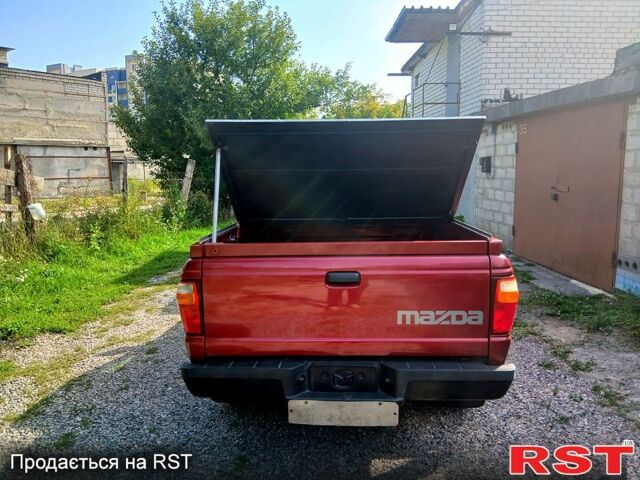 Червоний Мазда Б 2300, об'ємом двигуна 2.3 л та пробігом 8 тис. км за 11000 $, фото 4 на Automoto.ua