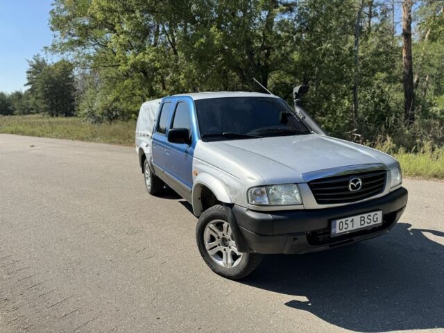 Синий Мазда Б серия, объемом двигателя 2.5 л и пробегом 387 тыс. км за 4750 $, фото 1 на Automoto.ua