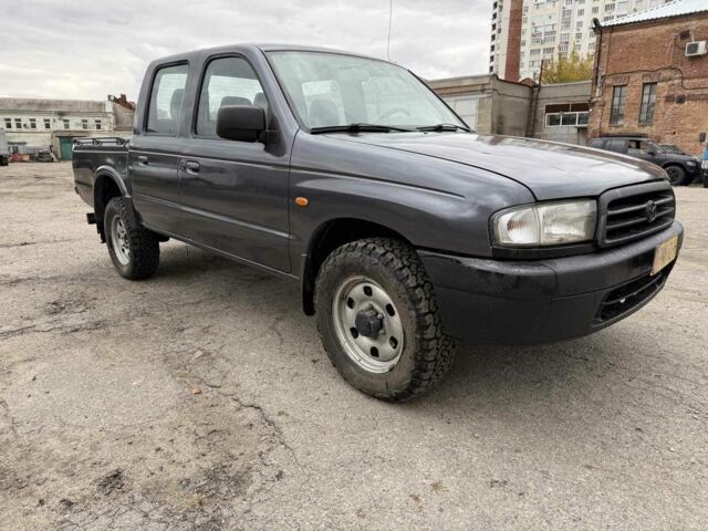 Серый Мазда БТ-50, объемом двигателя 2.5 л и пробегом 233 тыс. км за 3800 $, фото 3 на Automoto.ua