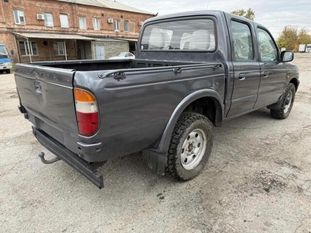 Серый Мазда БТ-50, объемом двигателя 2.5 л и пробегом 233 тыс. км за 3800 $, фото 5 на Automoto.ua