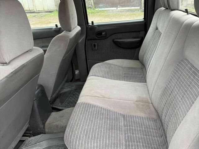 Серый Мазда БТ-50, объемом двигателя 2.5 л и пробегом 233 тыс. км за 3800 $, фото 7 на Automoto.ua