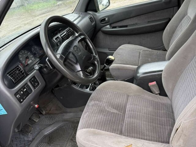 Серый Мазда БТ-50, объемом двигателя 2.5 л и пробегом 233 тыс. км за 3800 $, фото 6 на Automoto.ua