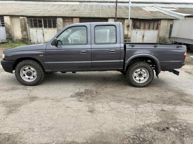 Серый Мазда БТ-50, объемом двигателя 2.5 л и пробегом 233 тыс. км за 3800 $, фото 1 на Automoto.ua