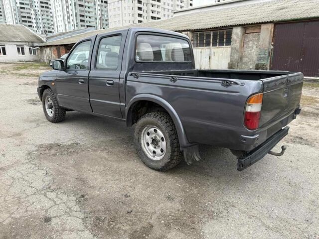 Серый Мазда БТ-50, объемом двигателя 2.5 л и пробегом 233 тыс. км за 3800 $, фото 2 на Automoto.ua