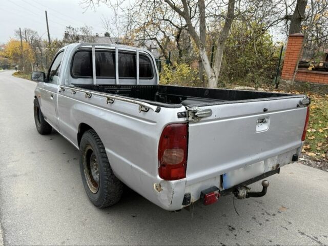 Серый Мазда БТ-50, объемом двигателя 2.5 л и пробегом 240 тыс. км за 3000 $, фото 3 на Automoto.ua