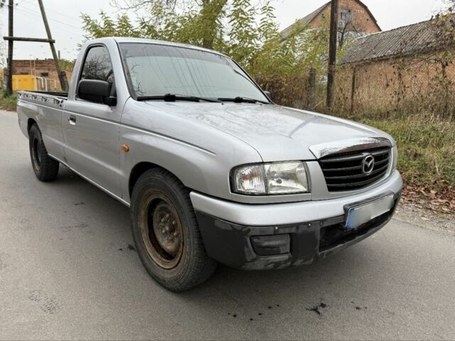 Серый Мазда БТ-50, объемом двигателя 2.5 л и пробегом 240 тыс. км за 3000 $, фото 1 на Automoto.ua