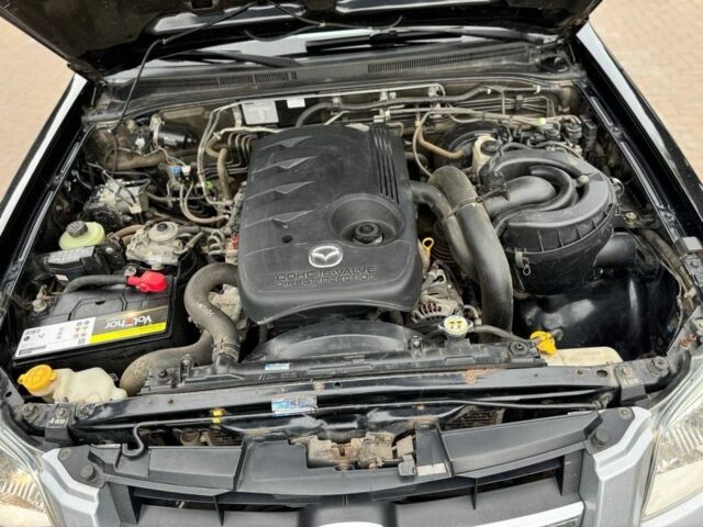 Серый Мазда БТ-50, объемом двигателя 2.5 л и пробегом 143 тыс. км за 11500 $, фото 6 на Automoto.ua