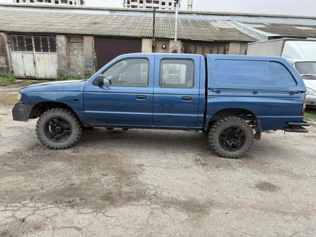 Синий Мазда БТ-50, объемом двигателя 2.5 л и пробегом 168 тыс. км за 3800 $, фото 1 на Automoto.ua