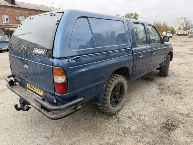 Синий Мазда БТ-50, объемом двигателя 2.5 л и пробегом 168 тыс. км за 3800 $, фото 5 на Automoto.ua