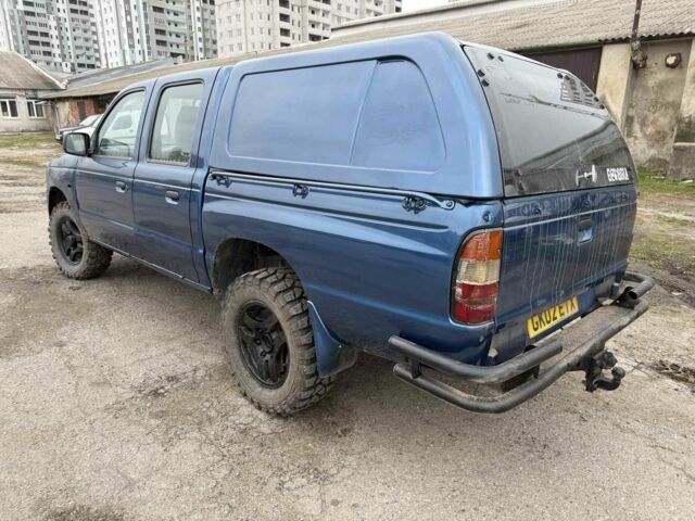 Синий Мазда БТ-50, объемом двигателя 2.5 л и пробегом 168 тыс. км за 3800 $, фото 2 на Automoto.ua