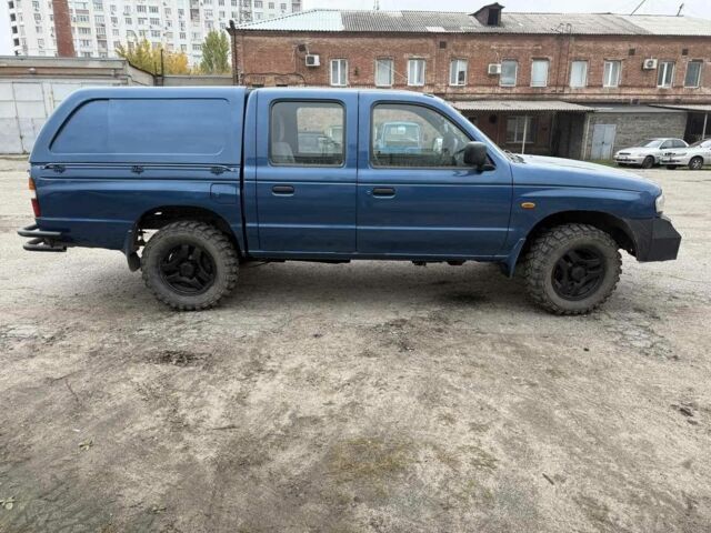 Синий Мазда БТ-50, объемом двигателя 2.5 л и пробегом 168 тыс. км за 3800 $, фото 4 на Automoto.ua