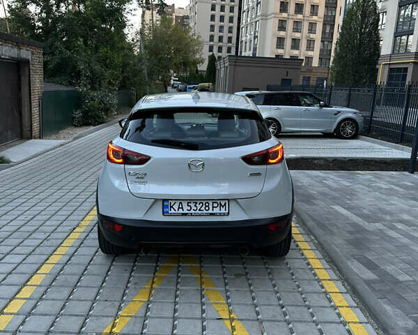 Білий Мазда СХ-3, об'ємом двигуна 2 л та пробігом 167 тис. км за 13600 $, фото 3 на Automoto.ua