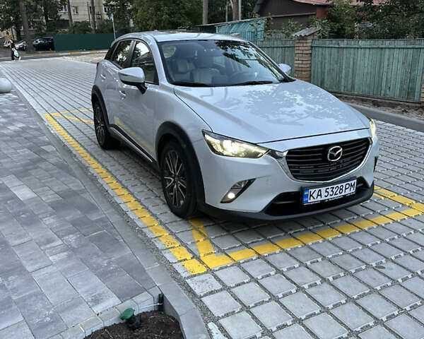 Білий Мазда СХ-3, об'ємом двигуна 2 л та пробігом 167 тис. км за 13600 $, фото 1 на Automoto.ua