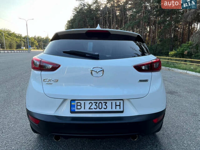 Белый Мазда СХ-3, объемом двигателя 2 л и пробегом 147 тыс. км за 16300 $, фото 12 на Automoto.ua