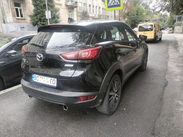 Черный Мазда СХ-3, объемом двигателя 2 л и пробегом 215 тыс. км за 312 $, фото 2 на Automoto.ua