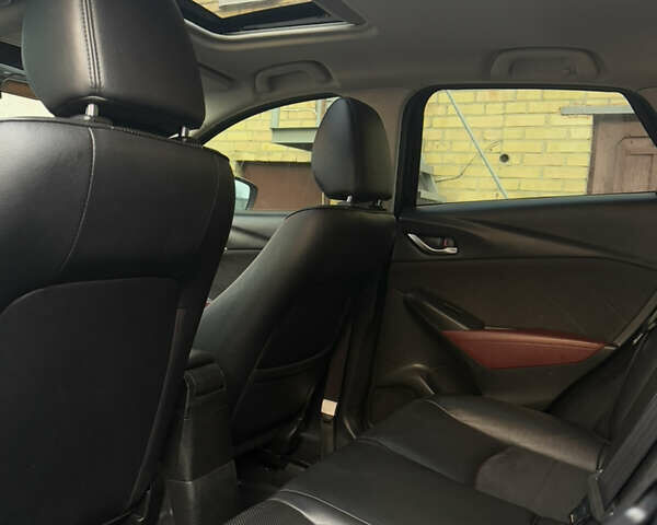 Чорний Мазда СХ-3, об'ємом двигуна 2 л та пробігом 149 тис. км за 15000 $, фото 12 на Automoto.ua