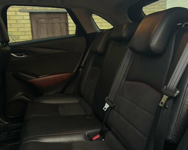 Чорний Мазда СХ-3, об'ємом двигуна 2 л та пробігом 149 тис. км за 15000 $, фото 11 на Automoto.ua