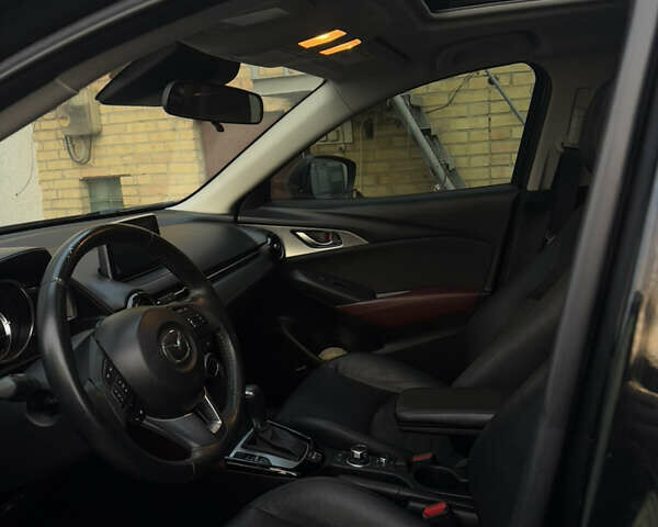 Чорний Мазда СХ-3, об'ємом двигуна 2 л та пробігом 149 тис. км за 15000 $, фото 14 на Automoto.ua