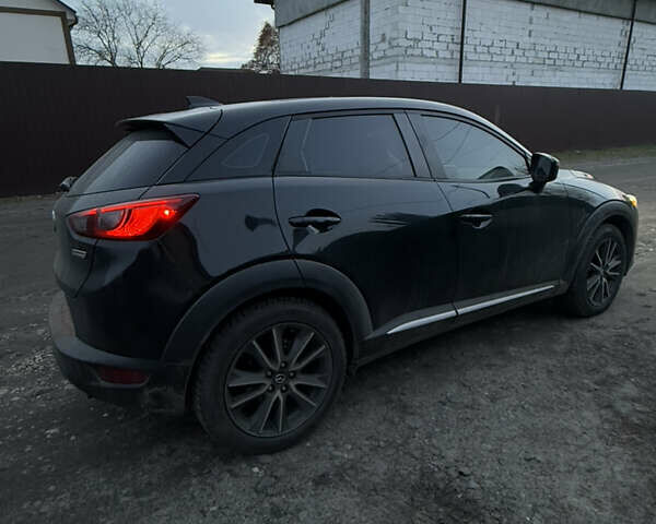 Чорний Мазда СХ-3, об'ємом двигуна 2 л та пробігом 149 тис. км за 15000 $, фото 5 на Automoto.ua