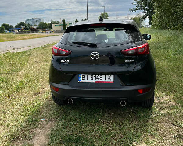 Чорний Мазда СХ-3, об'ємом двигуна 2 л та пробігом 60 тис. км за 16900 $, фото 5 на Automoto.ua