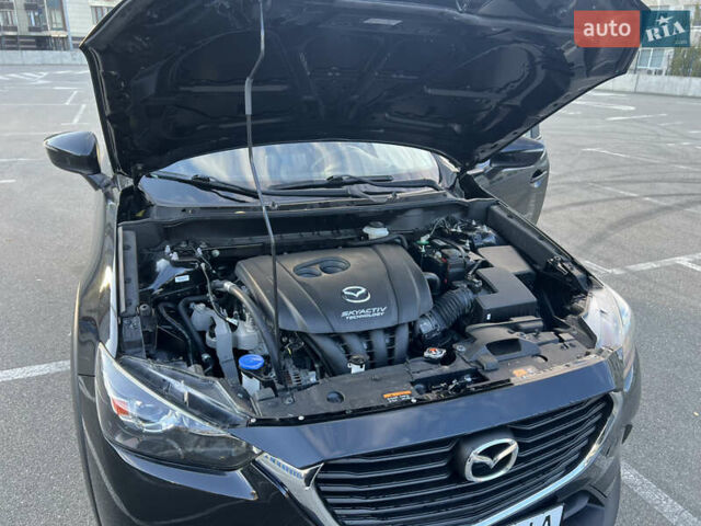 Чорний Мазда СХ-3, об'ємом двигуна 2 л та пробігом 72 тис. км за 13800 $, фото 39 на Automoto.ua