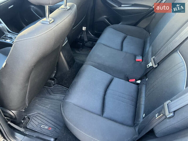 Чорний Мазда СХ-3, об'ємом двигуна 2 л та пробігом 72 тис. км за 13800 $, фото 27 на Automoto.ua