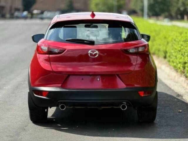 Червоний Мазда СХ-3, об'ємом двигуна 2 л та пробігом 89 тис. км за 9000 $, фото 4 на Automoto.ua