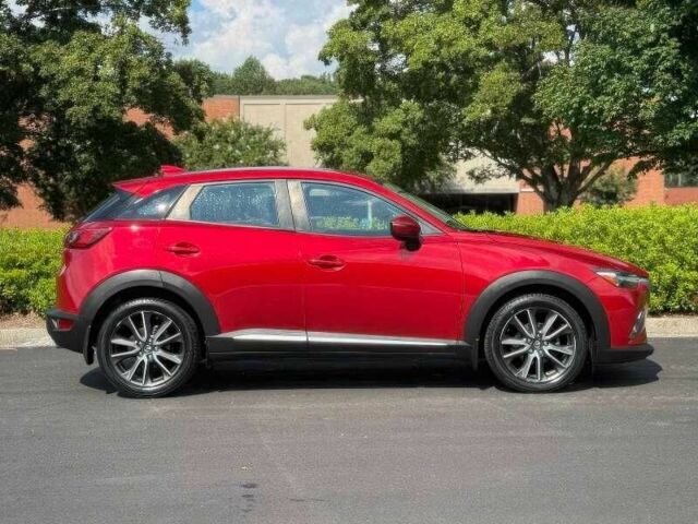 Червоний Мазда СХ-3, об'ємом двигуна 2 л та пробігом 89 тис. км за 9000 $, фото 5 на Automoto.ua