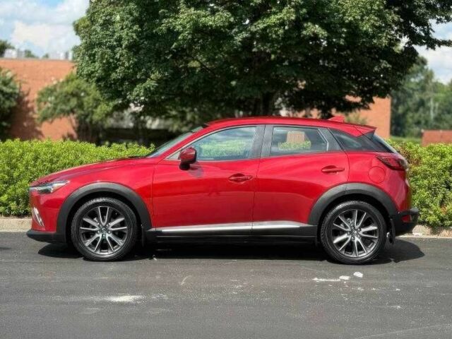 Червоний Мазда СХ-3, об'ємом двигуна 2 л та пробігом 89 тис. км за 9000 $, фото 6 на Automoto.ua