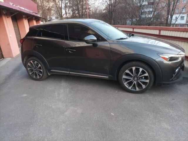 Серый Мазда СХ-3, объемом двигателя 2 л и пробегом 65 тыс. км за 14500 $, фото 1 на Automoto.ua