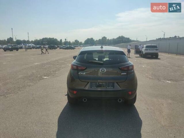Сірий Мазда СХ-3, об'ємом двигуна 1.8 л та пробігом 77 тис. км за 18900 $, фото 3 на Automoto.ua