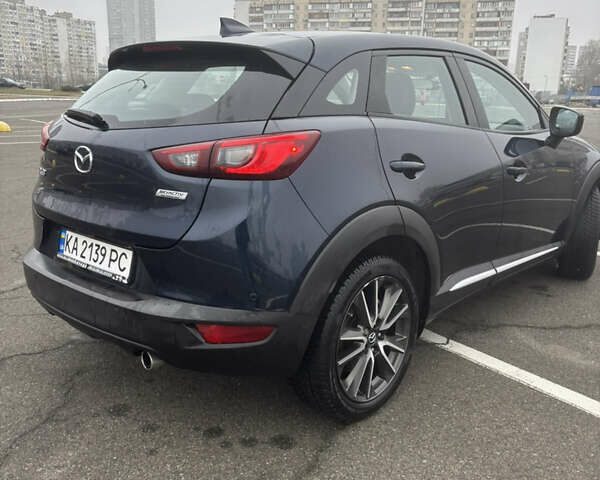 Синий Мазда СХ-3, объемом двигателя 2 л и пробегом 80 тыс. км за 14900 $, фото 3 на Automoto.ua