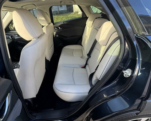 Синий Мазда СХ-3, объемом двигателя 2 л и пробегом 96 тыс. км за 17999 $, фото 12 на Automoto.ua