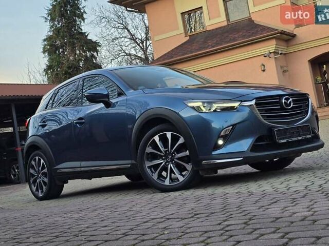 Синий Мазда СХ-3, объемом двигателя 1.8 л и пробегом 86 тыс. км за 21999 $, фото 4 на Automoto.ua